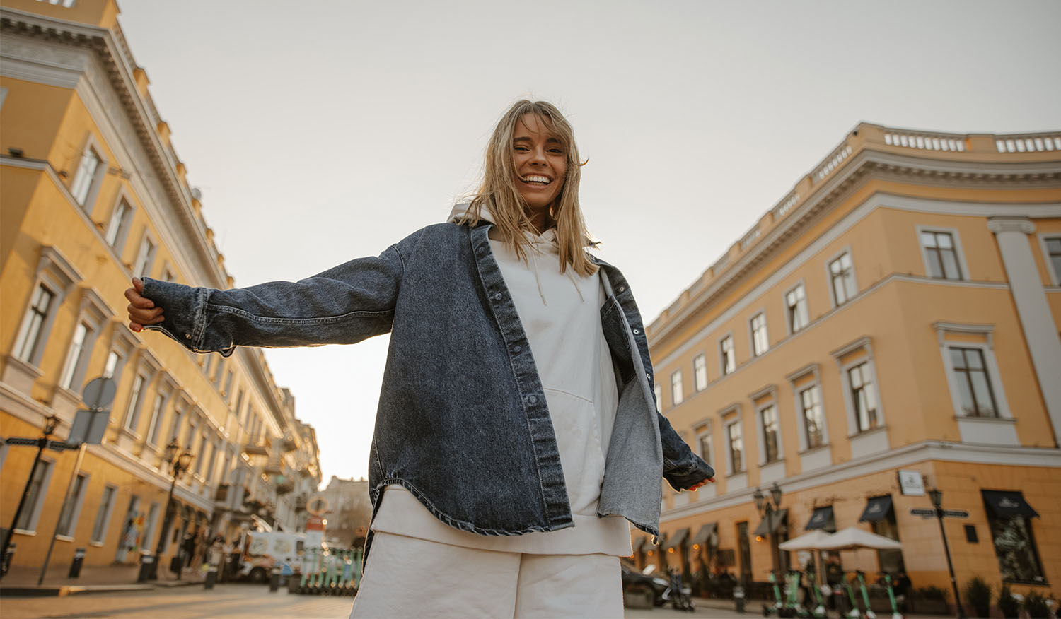 Smiling woman wearing a denim shirt